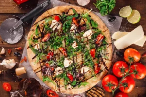 Background-03freshly-baked-pizza-lying-on-table-with-ingredient-2025-02-21-07-48-54-utc-1.webp